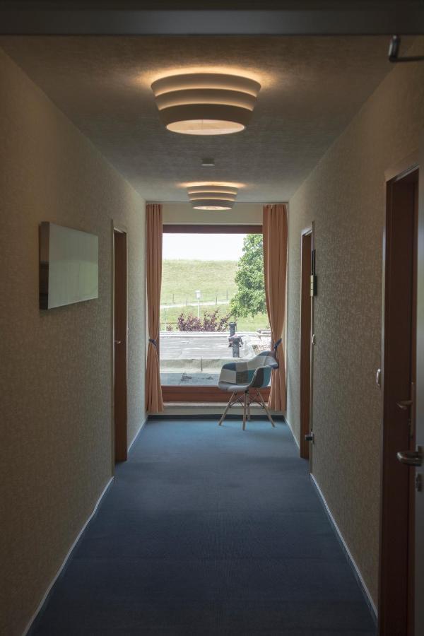 Hotel Am Friesenstrand Тосенс Екстериор снимка