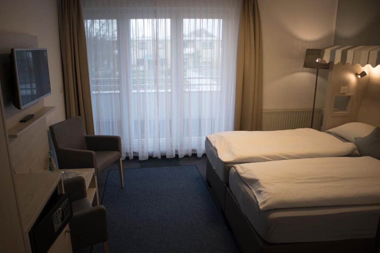 Hotel Am Friesenstrand Тосенс Екстериор снимка