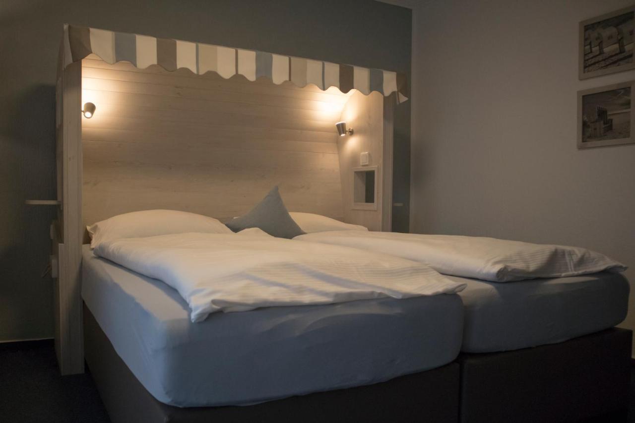 Hotel Am Friesenstrand Тосенс Екстериор снимка