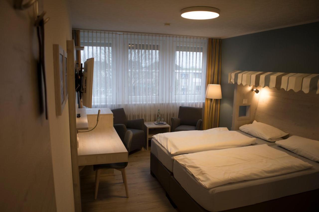 Hotel Am Friesenstrand Тосенс Екстериор снимка