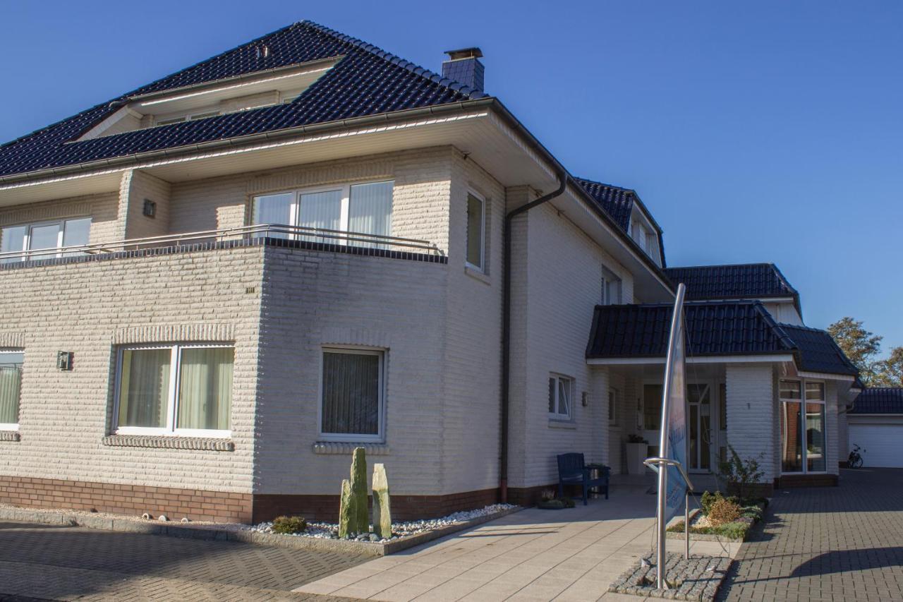 Hotel Am Friesenstrand Тосенс Екстериор снимка