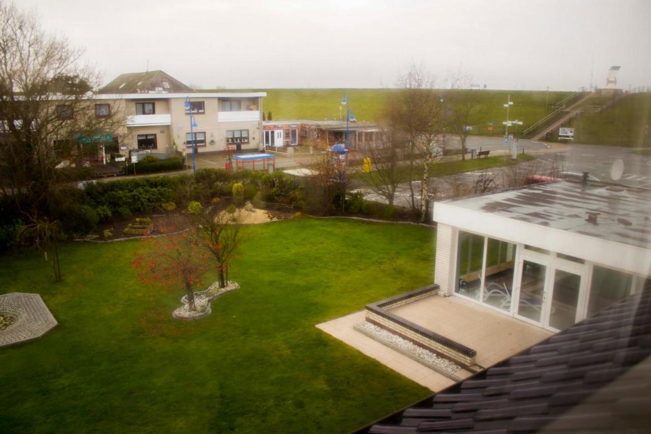 Hotel Am Friesenstrand Тосенс Екстериор снимка